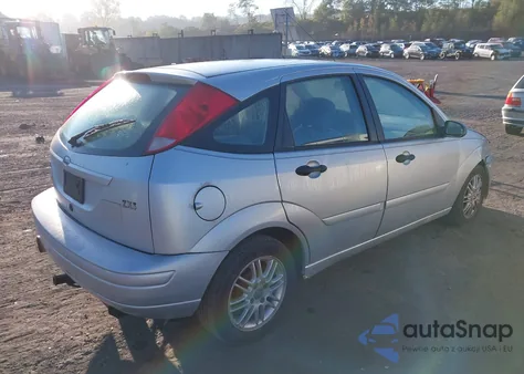 2003 Ford Focus Zx5 z USA, uszkodzony, nr VIN 3FAFP37343R186112
